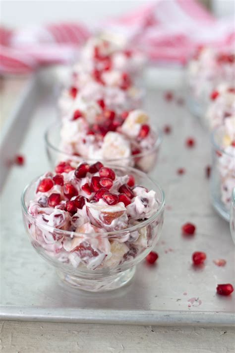 Pomegranate Salad With Bananas Apples And Sweet Whipped Cream A