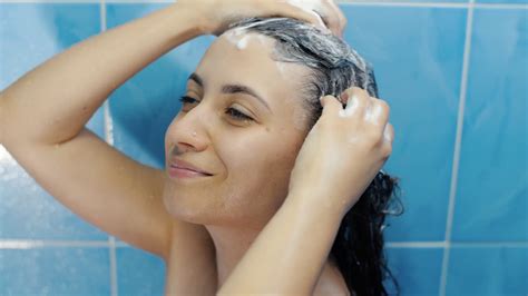Women Shampooing Their Hair Forward