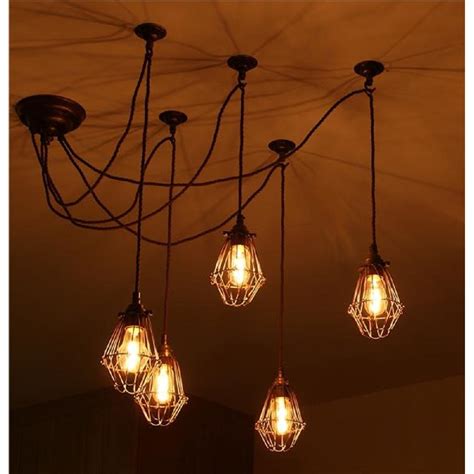 Not only factory inspired details. Pendant Cluster Ceiling Light with 5 Industrial Style Cage ...