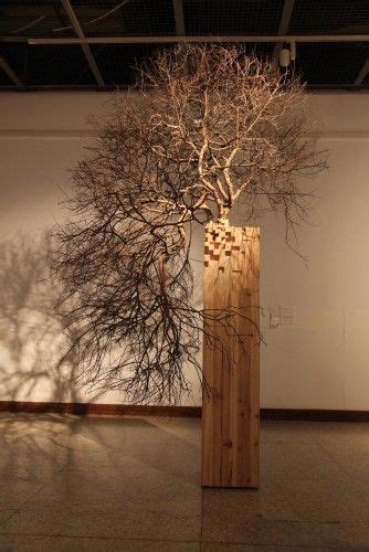 tree roots emerge from the ceiling in an installation by giuseppe licari artofit