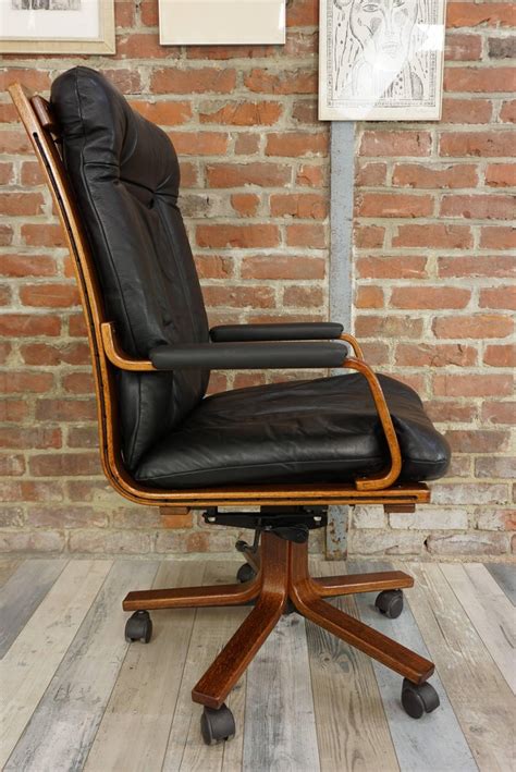 Enjoy free shipping on most stuff, even big stuff. Scandinavian Style Wooden and Black Leather Swivel Office ...