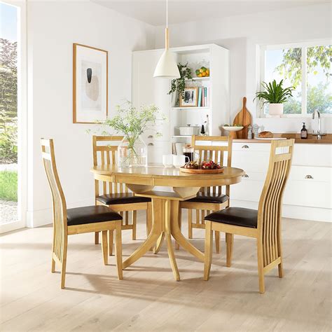 Hudson Round Oak Extending Dining Table With 6 Bali Chairs Brown