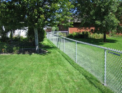 It does include a fair amount of strength and physical labor, but if you follow a set pattern of installation, the actual process is easy enough for an average homeowner to take on. Chain Link Photos