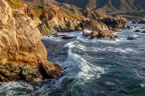 The Rugged Pacific Coast And Surf In Big Sur California Stock Photo