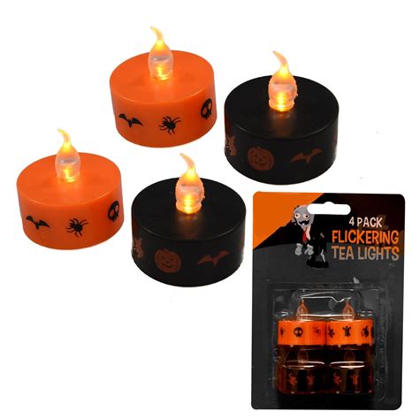 flickering halloween tea light flameless led candles orange and black 4 pack set