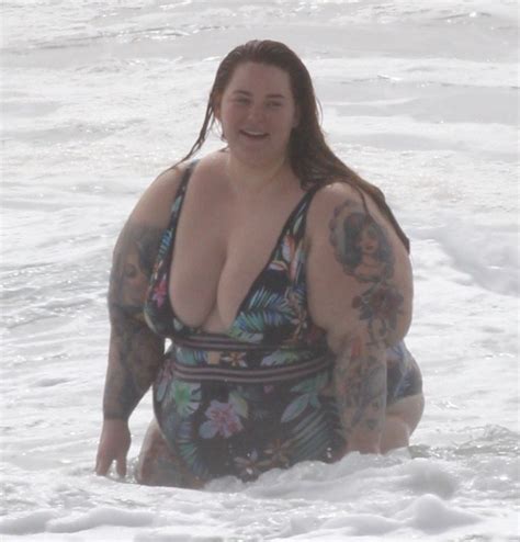 Tess Holliday Slays In Low Cut Swimsuit Amid Piers Morgan Obesity Row