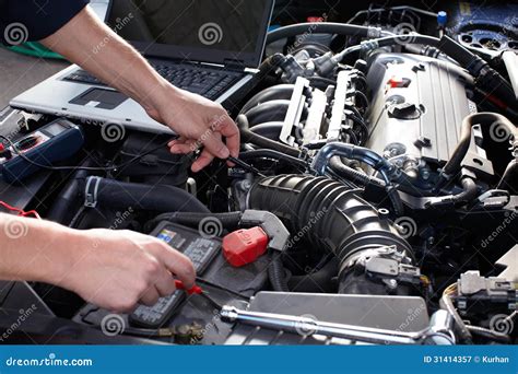 Car Mechanic Working In Auto Repair Service Royalty Free Stock