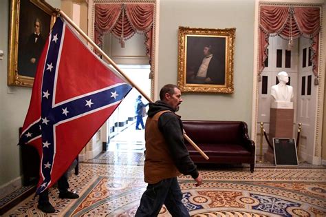 Man Carrying Confederate Flag Inside Us Capitol During Riot Arrested In