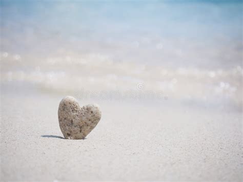 Stone Heart Shape Standing On Summer Beach Sand Stock Image Image Of