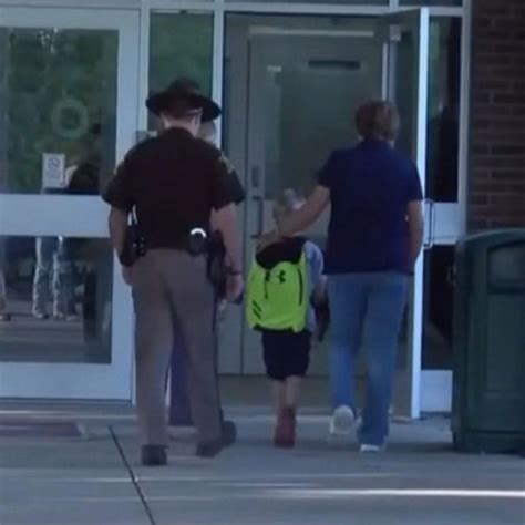 Video Boy Gets Police Escort To School After Officer Dads Death Abc News