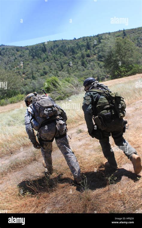 A Member Of The California National Guard Counterdrug Task Force And A