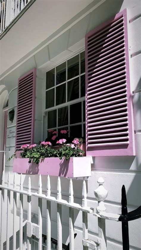 I Found The Cutest Home With Pink Shutters And Pink Flower Boxes In