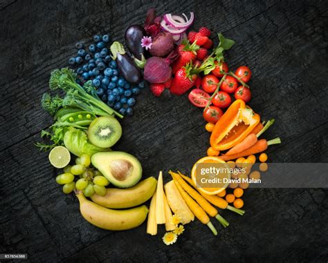 Fruit And Vegetable Colour Wheel On A Black Surface High Res Stock