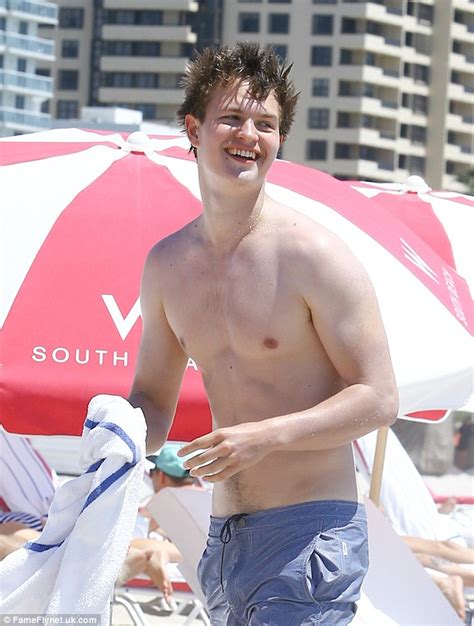 Ansel Elgort Has Baywatch Moment As He Runs Shirtless After Miami Beach