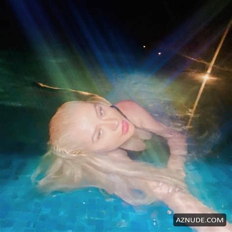 Christina Aguilera Displays Her Tits While Swimming In One Piece In The