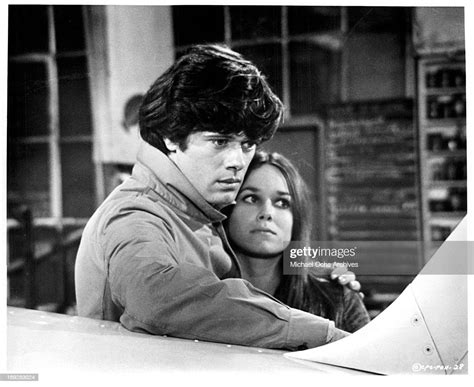 michael sarrazin holds barbara hershey in a scene from the film the news photo getty images