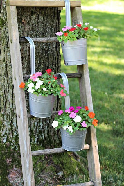 If you want to utilize a space even better, you can make yourself a cute mounted plant shelf where you can place quite a few pots. DIY Galvanized Planters and Ladder Plant Stand | Days of ...