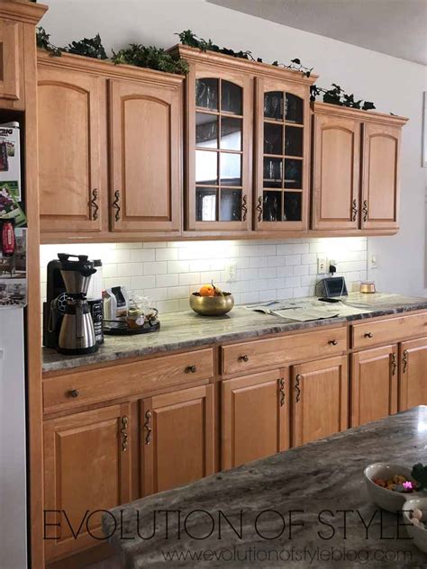 One approach is to stick to similar shades and intensities, such as butter yellow with dove gray, for a cohesive look. Mindful Gray Kitchen Cabinets - Evolution of Style