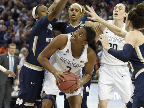 Connecticut Forward Morgan Tuck Tries To Shoot Surrounded By Nd
