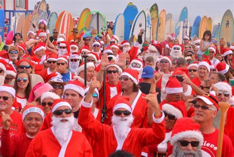 Hundreds Of Surfing Santas Catch Waves At Florida Beach For 7th Year In