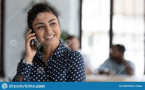 Happy Indian Millennial Startup Leader Talking On Mobile Phone Stock