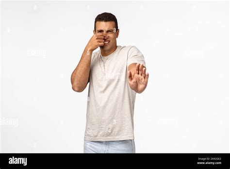 Guy Feel Disgusted From Awful Bad Smell Rejecting Stinky Cheese Plate