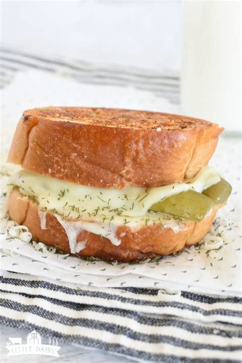 Preheat you grill pan on low/medium heat, spread 1 tablespoon finlandia butter on the top side of sandwich, place this side. Dill Pickle Bacon Grilled Cheese Might Just Be The Best ...