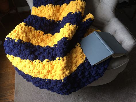 These are reasonably priced and are available in two. WVU chunky knit blanket done in gorgeous Navy Blue and ...