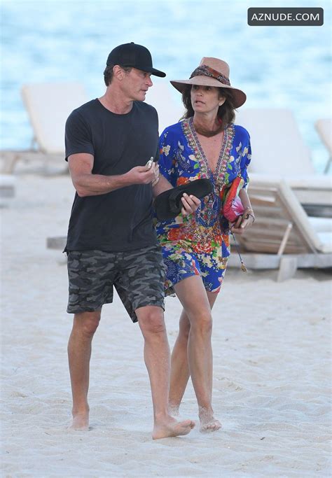 Cindy Crawford And Husband Rande Gerber Relax On The Beach In Miami