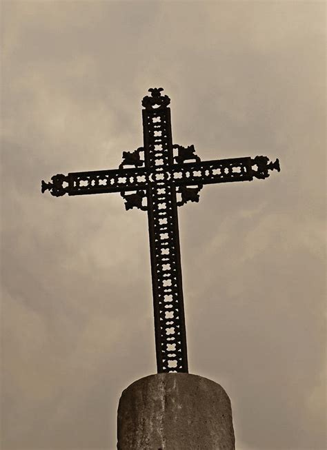 But don't make it too small, you should be able to see it. Paris Cemetery Cross Photograph by Tony Grider