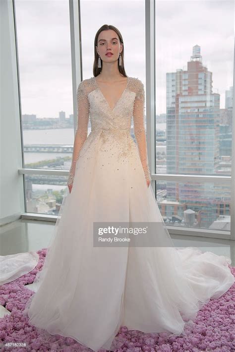 A Model Poses During The Fall 2015 Bridal Collection Pamella Rowland