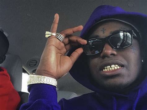 The rapper, real name bill k. Kodak Black's Police Station Photo Following His Arrest ...
