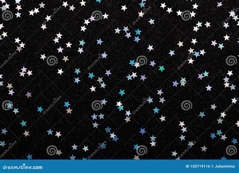 Iridescent Silver Stars Confetti On Black Festive Holiday Background