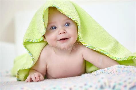 Happy Baby Girl Under Green Towel Stock Photos Free Royalty Free Stock Photos From Dreamstime