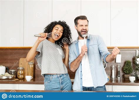 Multiracial Couple In Love Spends Leisure At Home Stock Image Image Of Singing Playing 209743295
