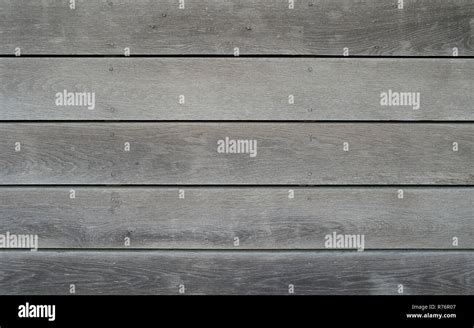 Close Up Background Texture Showing Weathered Wooden Planking Stock