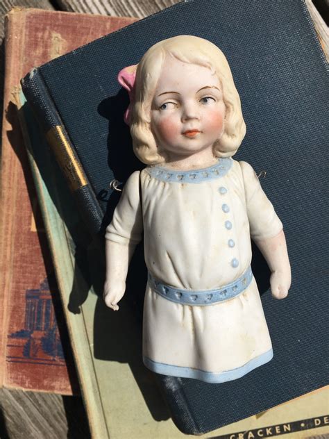 Hertwig Antique German Jointed Bisque Doll With Molded Hair And Clothes