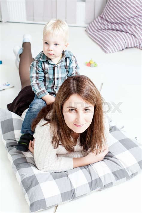 mom plays with son stock image colourbox