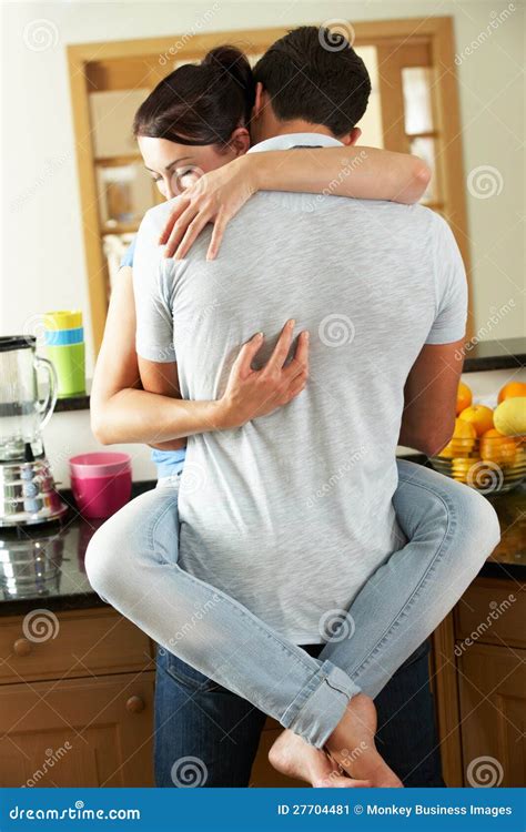 romantic couple hugging in kitchen stock image image of counter person 27704481