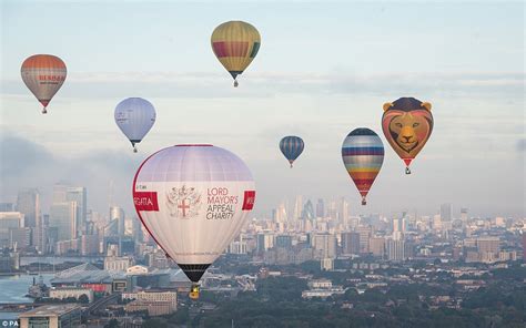 27 Hot Air Balloons Soar Over London On Sunday Daily Mail Online