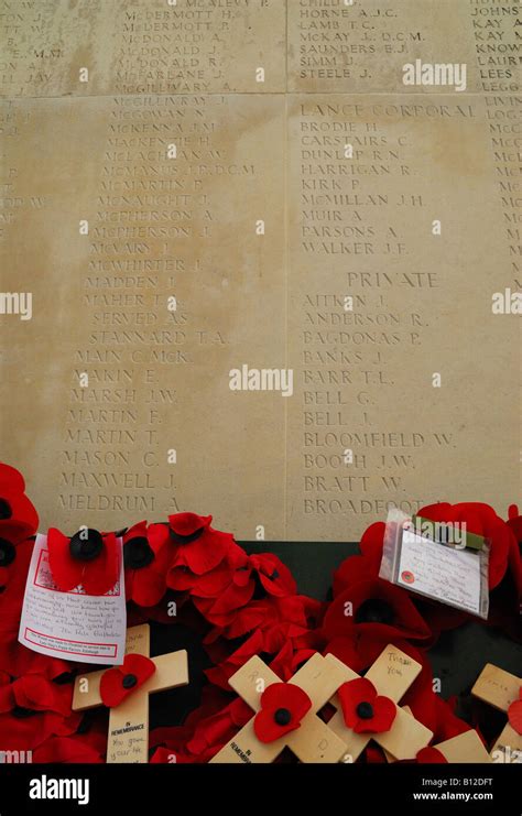 Poppy Wreath Laid By Names Of Missing Soldiers Inscribed In Menin Gate