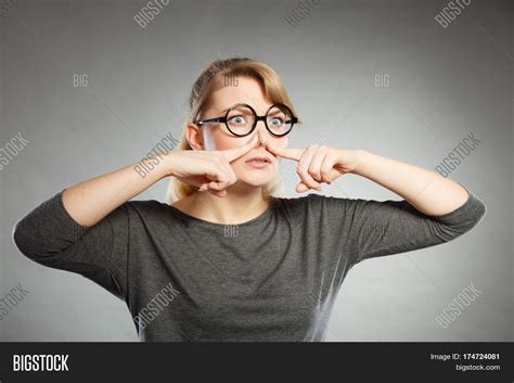 Girl Pinches Her Nose Image Photo Free Trial Bigstock