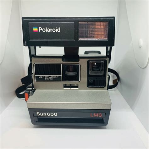 Vtg Polaroid Sun 600 Camera Lms Black Silver With Strap Plus Bw Film