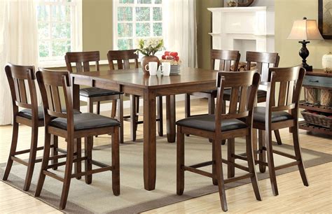 The easiest way to achieve a uniform look in your dining room is replacing most of the furniture. Brockton Ii Rustic Oak Extendable Counter Height Dining ...
