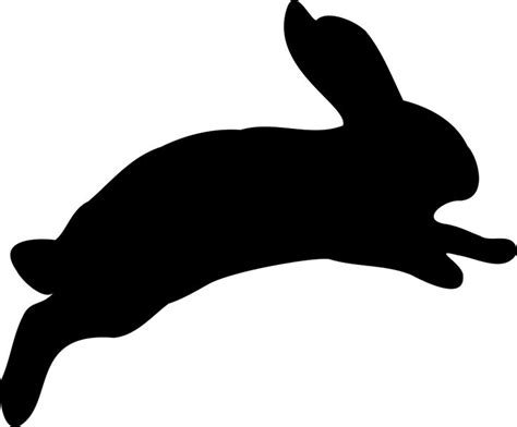 A Black Silhouette Of A Rabbit Jumping In The Air