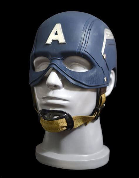 Pull the red backing off the adhesive tape and press the taped end of the wing down firmly against the side of the helmet. 1:1 The Avengers Full Scale Captain America Steve Rogers ...