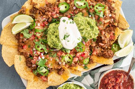 Learn how to make nachos the easy, cheesy, and sometimes spicy way with these awesome nacho recipes. Nachos - Sac Tacos - The Best Taco Catering in Sacramento