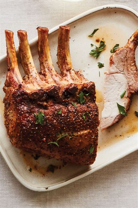 Remove the pan from the oven, transfer the meat and vegetables to a serving platter, and tent loosely used a pork loin roast with bone (2 3 1/2+ from ydfm). Signature™ Bone-In Pork Loin Rack Roast with Rub Seasoning Packet in 2020 | Pork rib roast, Food ...