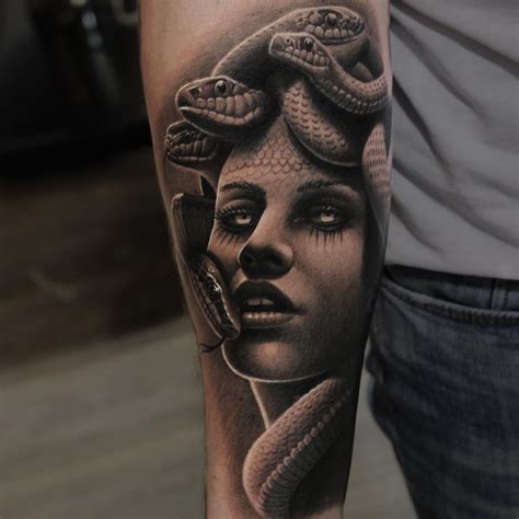 Man with medusa tattoo on left half sleeve. 47+ Awesome Medusa Face Tattoos