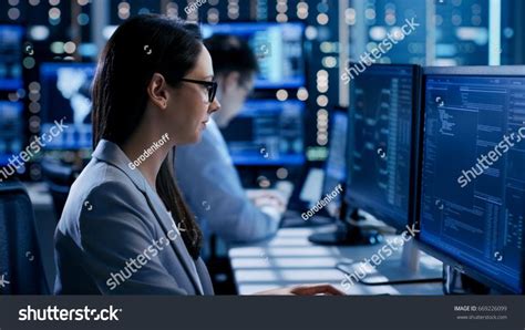 Female Engineer Controller Observes Working Of The System In The